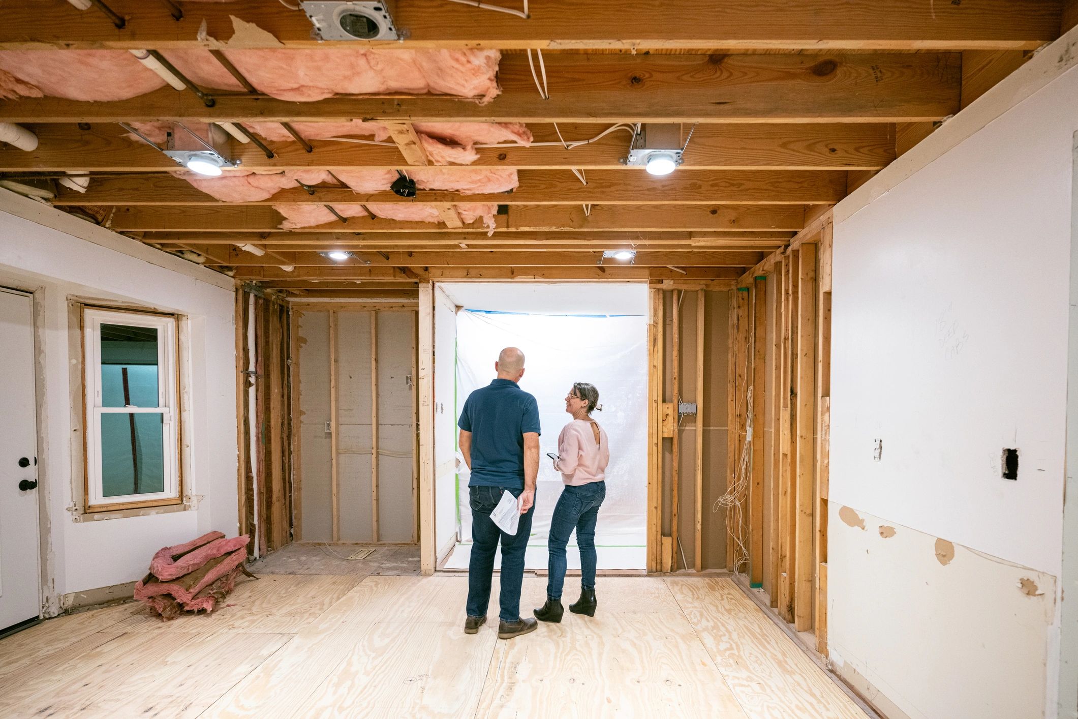 Homeowners reviewing a remodeling project